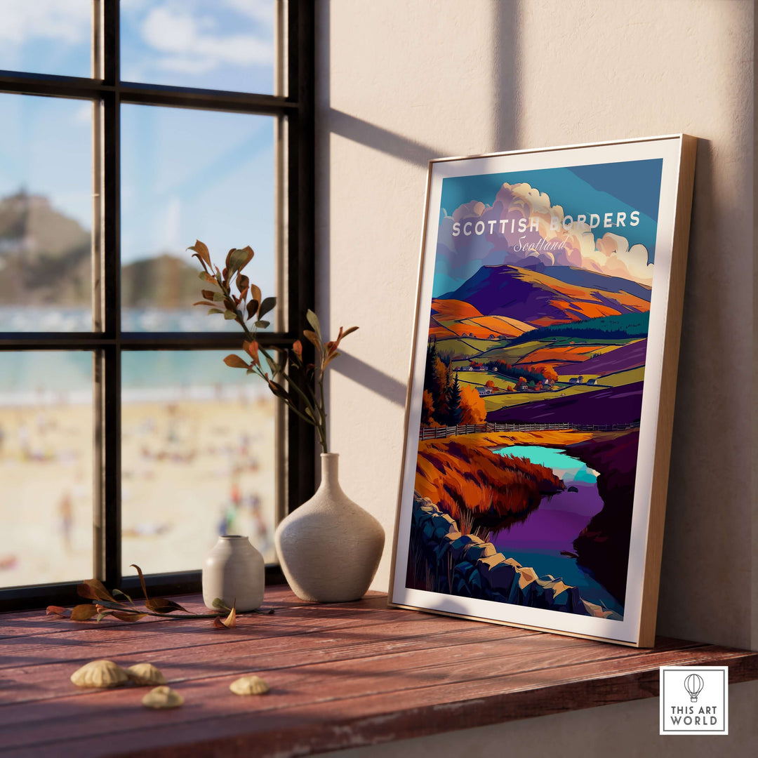 Scottish Borders autumn landscape poster featuring vibrant colors and serene lake, displayed indoors.