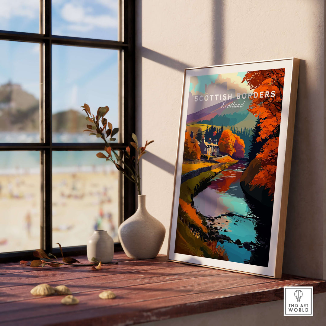 Scottish Borders river scene travel print with autumn trees, colorful poster wall art displayed indoors.