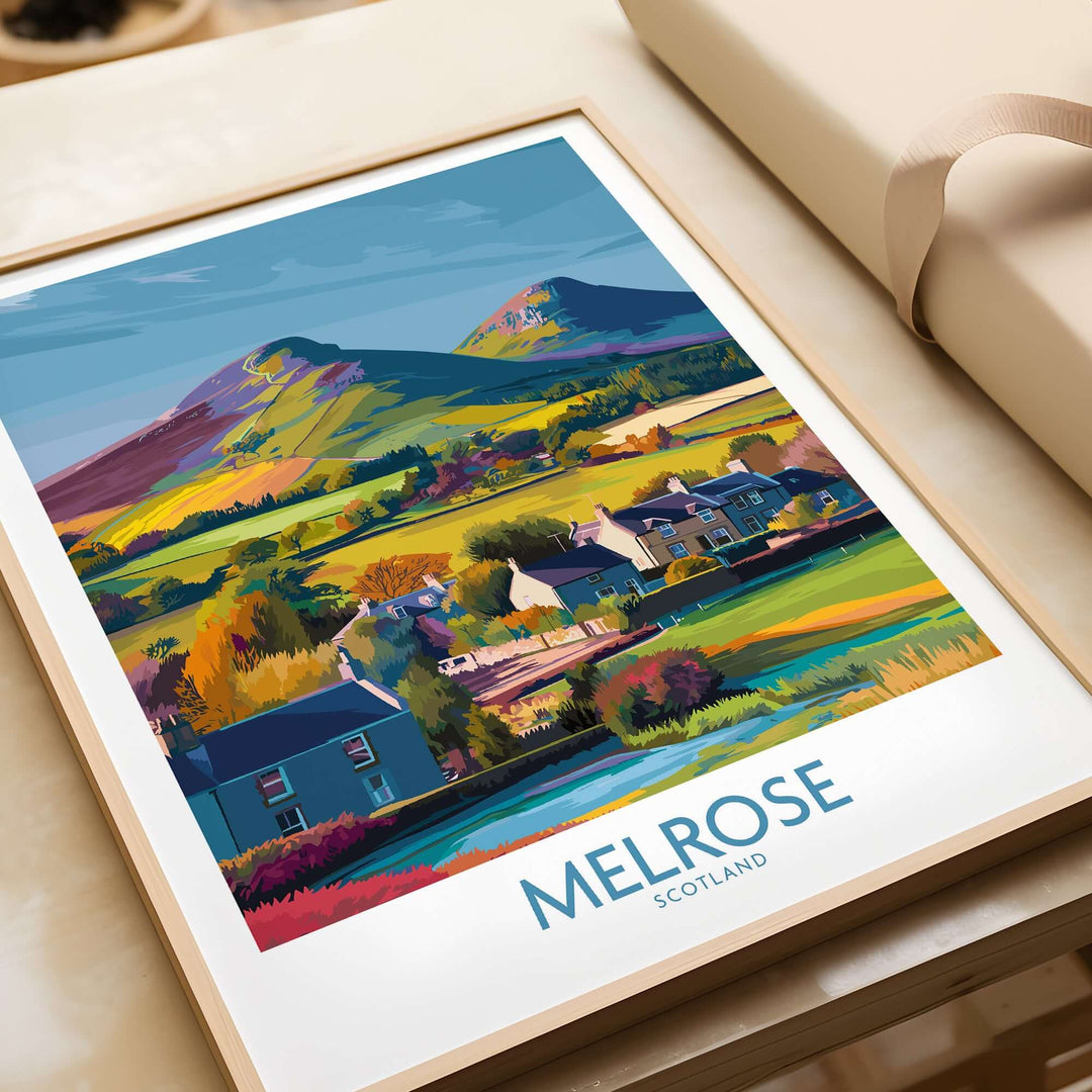 Scottish Borders travel poster featuring Melrose village and Eildon Hills in vibrant colors, framed artwork.