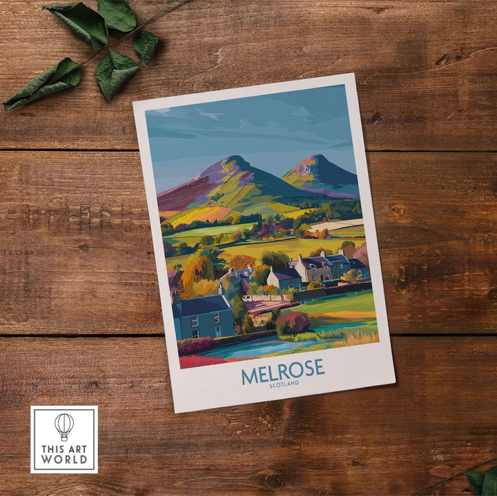 Scottish Borders Melrose travel poster featuring Eildon Hills and village homes in autumn colors.