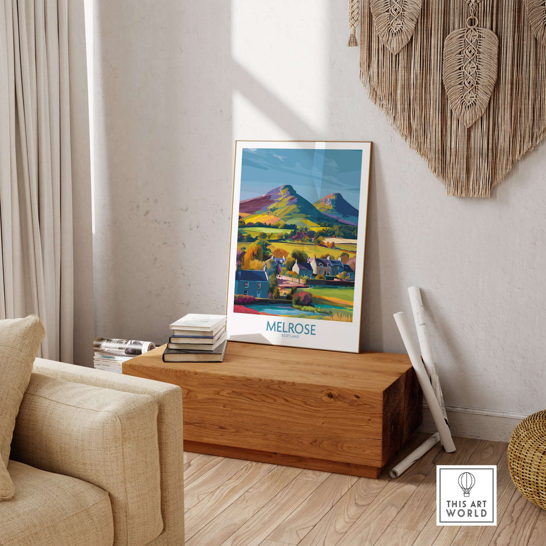 Scottish Borders Melrose village travel poster with Eildon Hills, colorful wall art in a cozy living room setting.