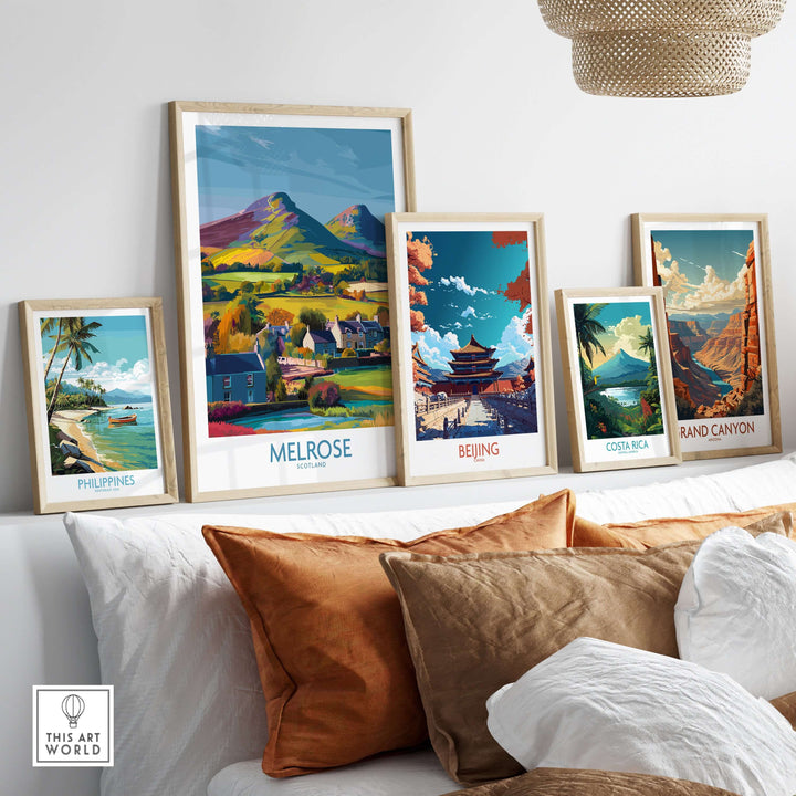 Colorful wall art featuring travel posters of Melrose, Beijing, Costa Rica, and the Grand Canyon.