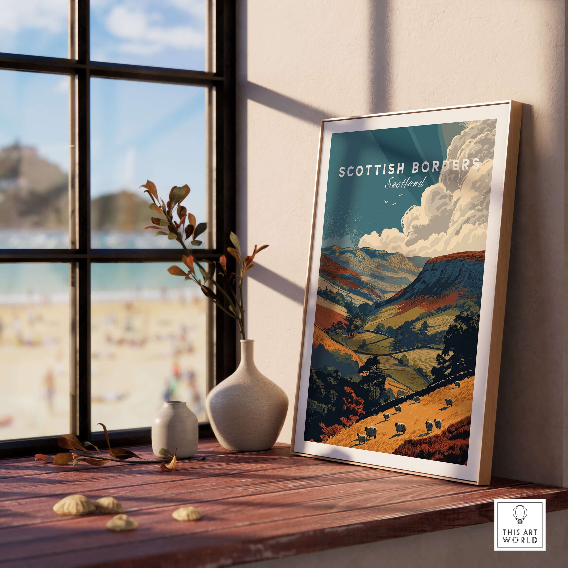 Scottish Borders Sheep Grazing Travel Poster Valley Landscape Scotland Print Wall Art displayed on a wooden table.