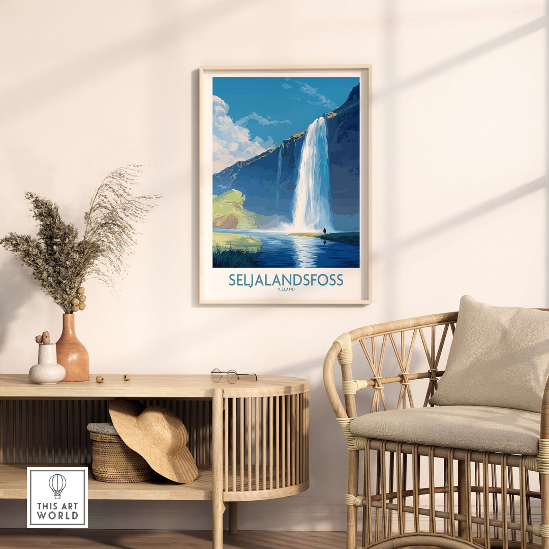 Seljalandsfoss Iceland Art Print displayed in a cozy interior setting with a wooden chair and plant.