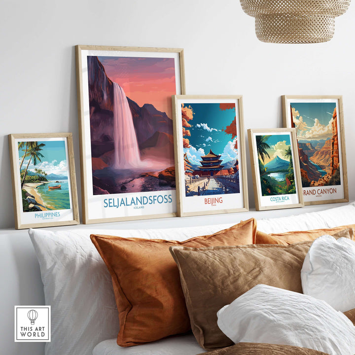 Seljalandsfoss Iceland Sunset Waterfall Art Print | Pink Sky Travel Poster displayed in a cozy living room setting.