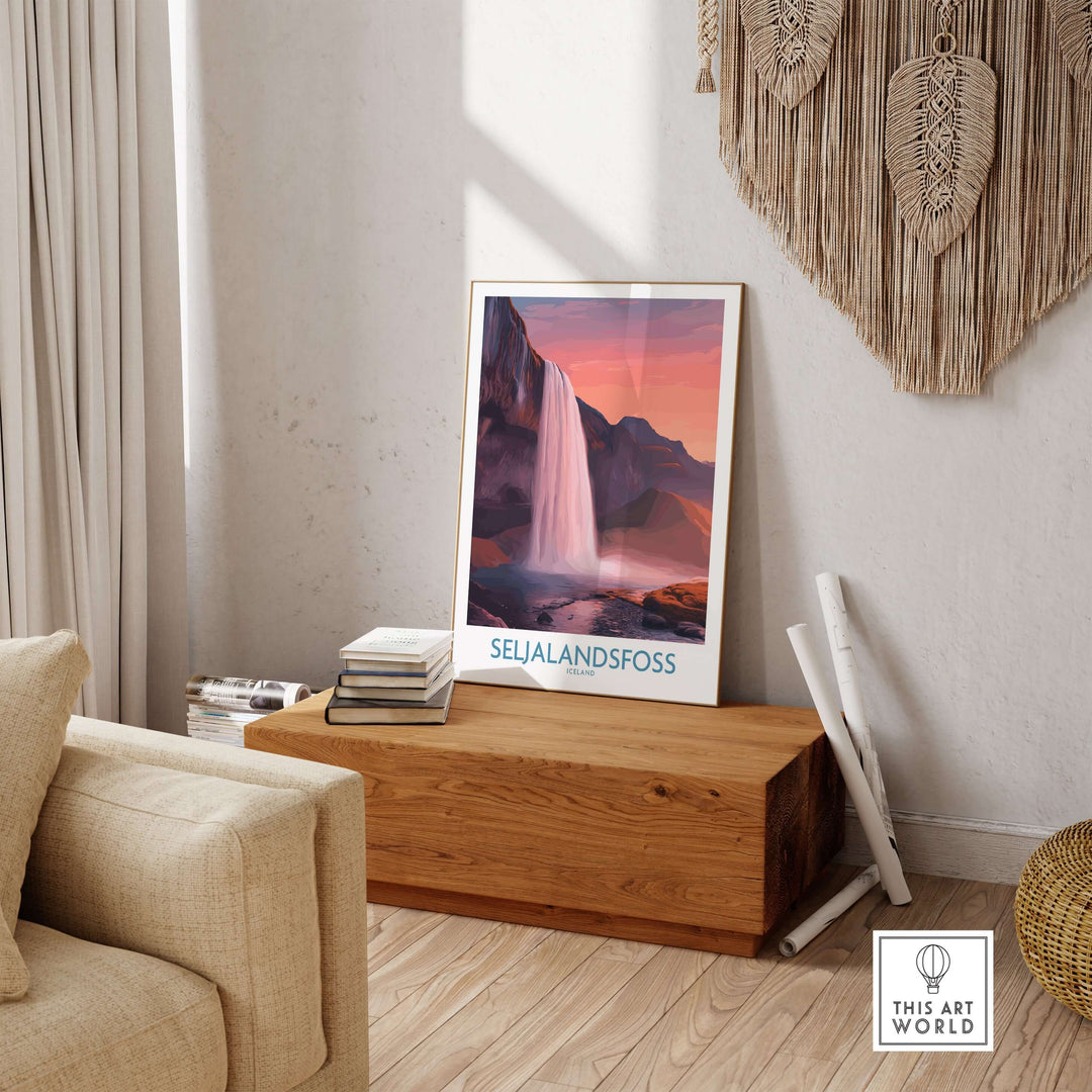 Seljalandsfoss Iceland Sunset Waterfall Art Print | Pink Sky Travel Poster displayed in a cozy living room setting.