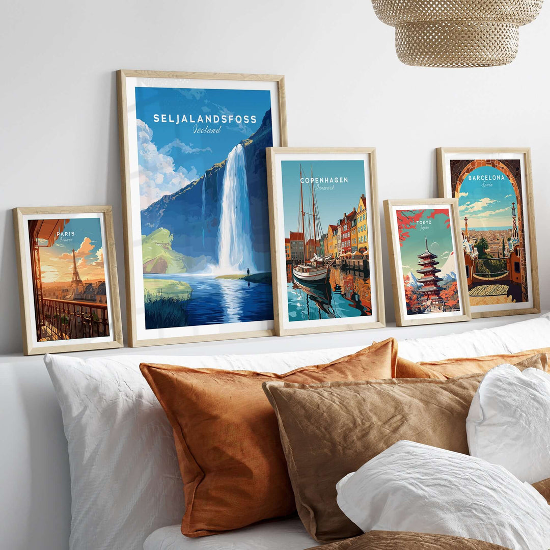 Seljalandsfoss Wall Art Iceland displayed in a cozy home setting with other city-themed wall art.