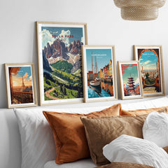 Sella Pass Poster Italy displayed among other travel posters on a stylish interior wall.