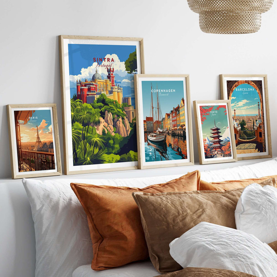 Sintra Poster | Portugal Print Pena Palace displayed among framed travel art prints on a stylish sofa.