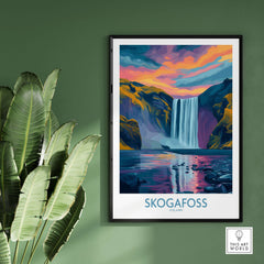 Skógafoss Iceland Sunset Art Print | Waterfall Reflection Poster displayed on a wall with tropical plants.