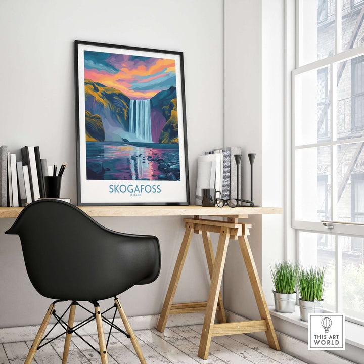 Skógafoss Iceland Sunset Art Print | Waterfall Reflection Poster displayed on a desk with plants and books.