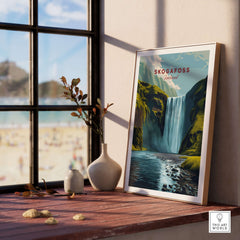 Skógafoss Icelandic Landscape and River Print | Nordic Nature Wall Decor framed on a table with a beach view.