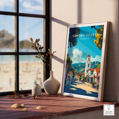 Sonoma County Art Print - California Village Poster - Wine Country Wall Decor framed on a windowsill with beach view.