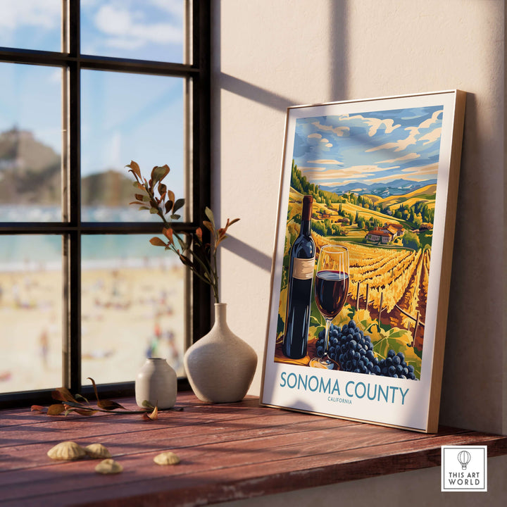 Sonoma County vineyard sunset poster with wine and grapes, California art print displayed indoors.