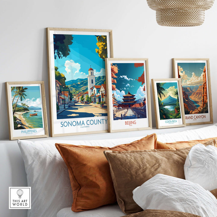 Colorful travel prints including Sonoma Town, Philippines, Beijing, Costa Rica, and Grand Canyon on a wall.