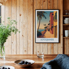 Sotogrande Spain Poster | Sunny Andalusian Village Scene Canvas Print displayed on a wooden wall with natural decor.