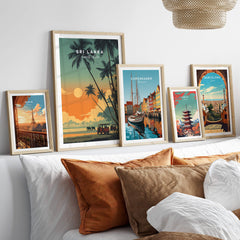 Sri Lanka Wall Art Print | Elephant Safari Sunset Travel Poster displayed among other travel posters in a stylish interior setting.