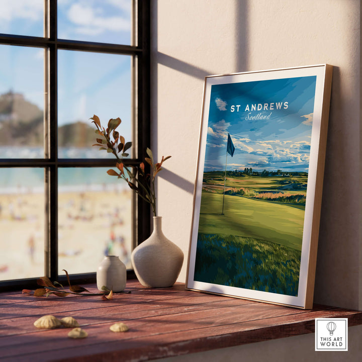 St Andrews Scotland golf poster displayed on a window sill, showcasing iconic golf landscape and vibrant colors.