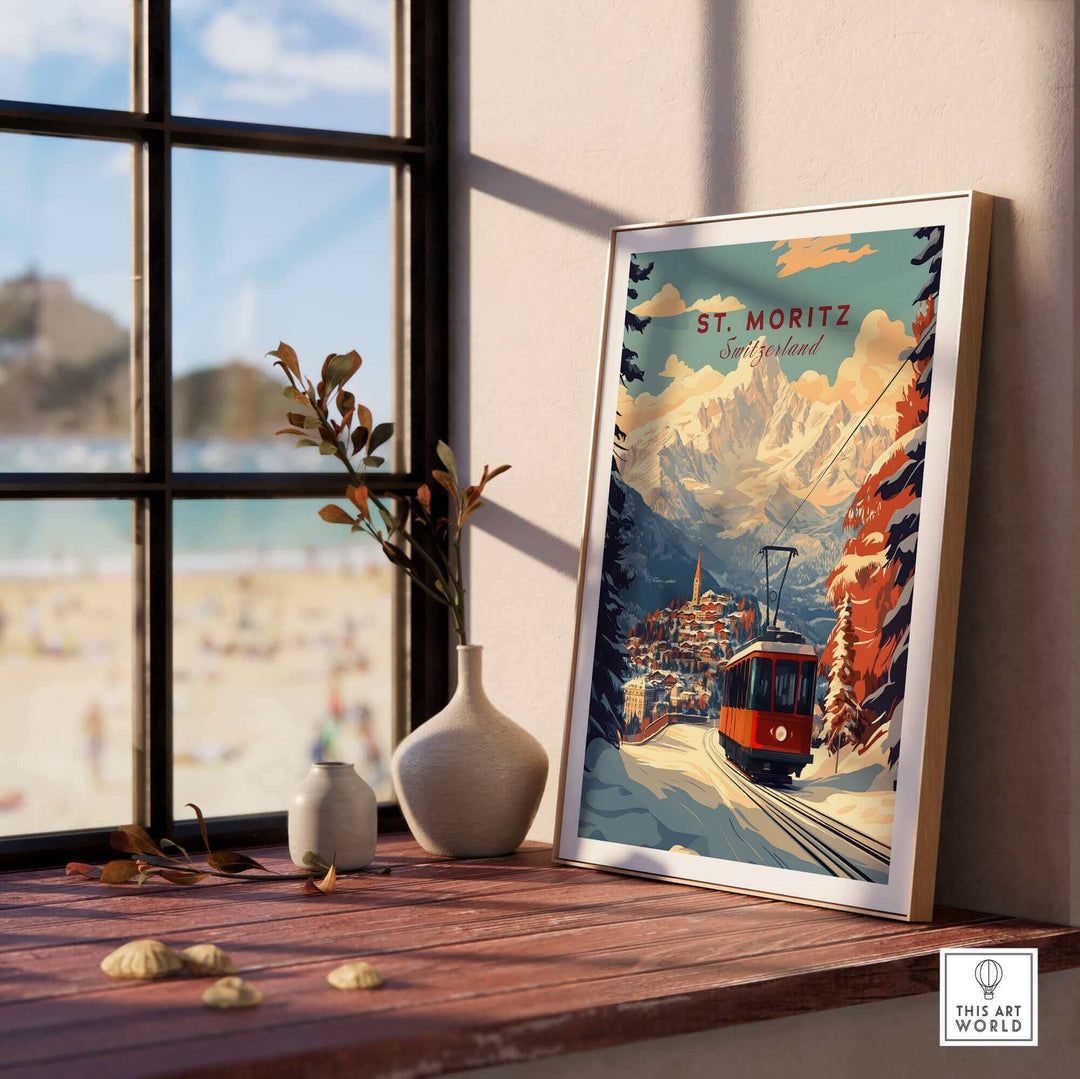 St Moritz Ski Poster featuring a scenic winter landscape of Switzerland placed on a wooden table near a window.