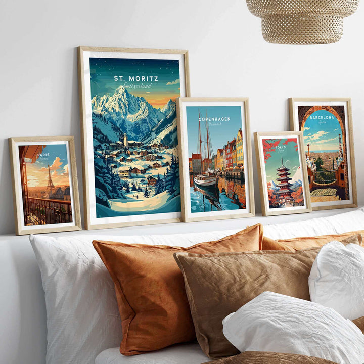 St Moritz Ski Poster in a collection of framed travel prints above a sofa.