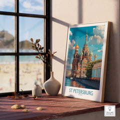 St Petersburg Russia Canvas Print | Historic Cathedral & Canal Scene Poster displayed on a wooden table by a window.
