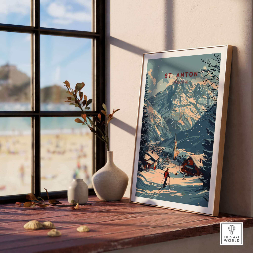 Scenic St. Anton ski poster Austria displayed on a wooden windowsill with mountain views, enhancing decor with vintage travel art.