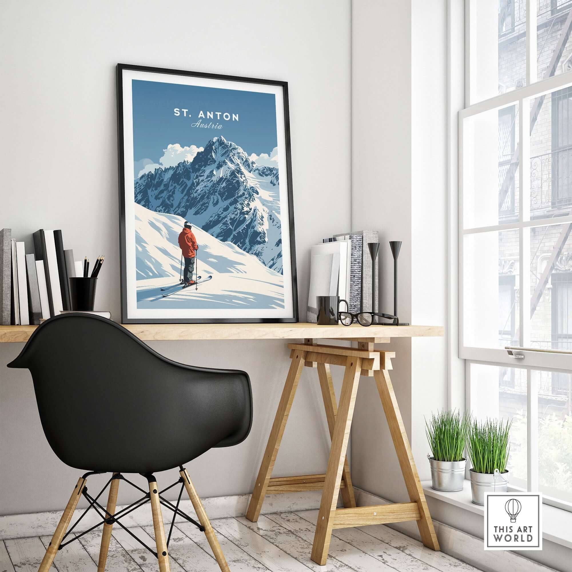 St. Anton ski print on a wall in a stylish home office, showcasing mountains and a skier, perfect for ski enthusiasts.