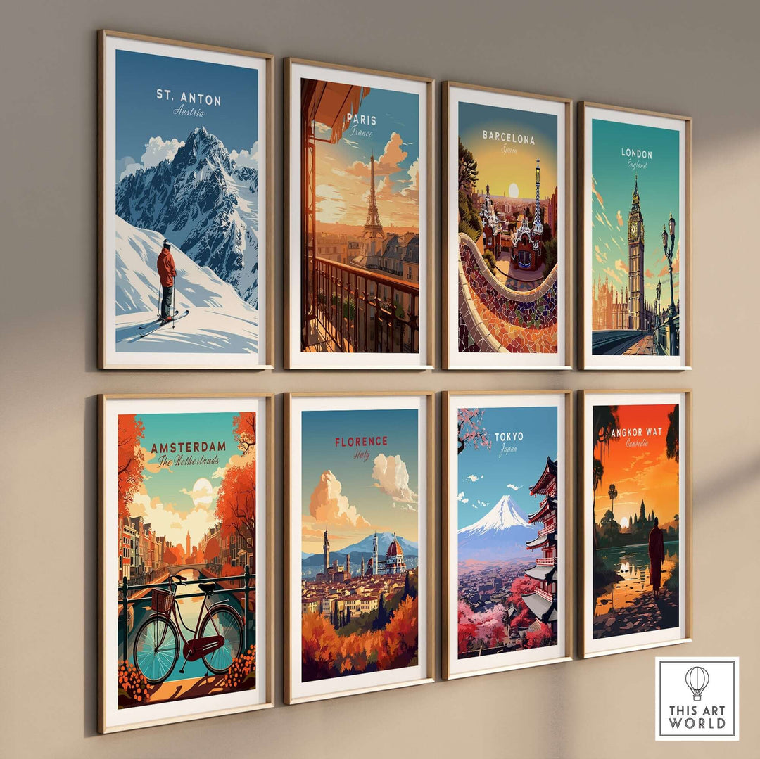 Collection of framed city and mountain prints featuring St. Anton, Paris, Barcelona, London, Amsterdam, Florence, Tokyo, and Angkor Wat.