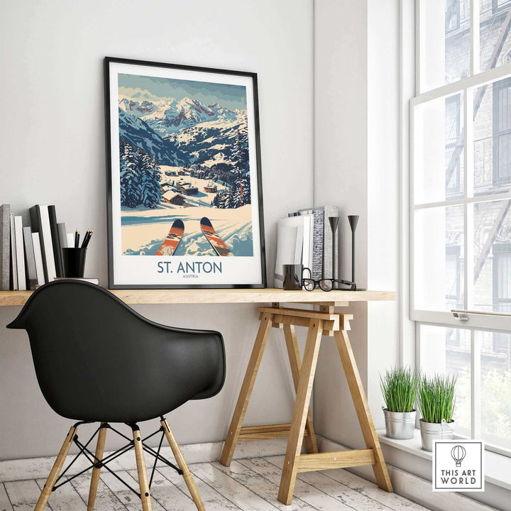 St. Anton wall art ski poster displayed on a desk in a modern room with a view, highlighting alpine scenery and skiing theme.