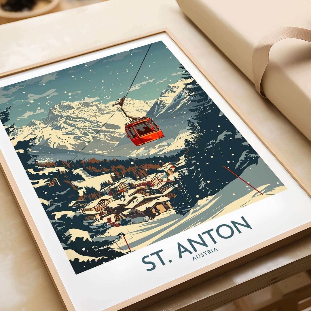 St. Anton Wall Art Ski Poster depicting a snowy mountain landscape with a red cable car over alpine village scenery.