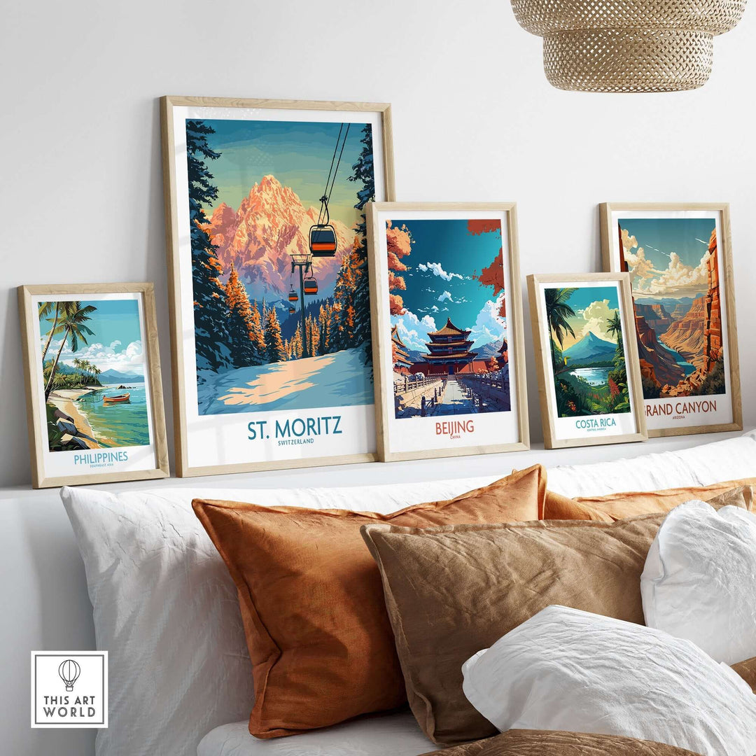 St. Moritz Ski Print and travel art collection displayed on a wall above a cozy couch, featuring scenic landscapes.