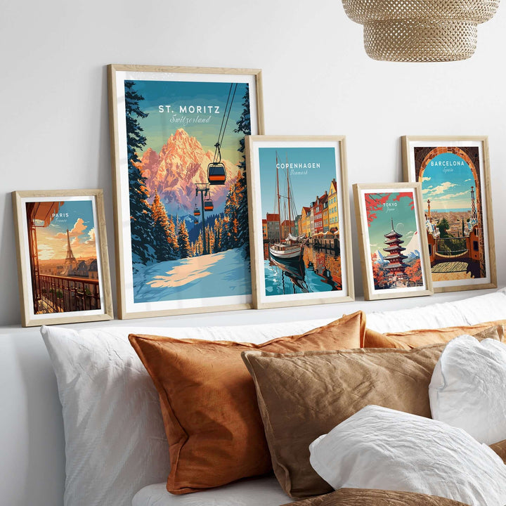 St. Moritz travel poster with scenic mountain view and ski lift, alongside other framed travel art in stylish home decor.