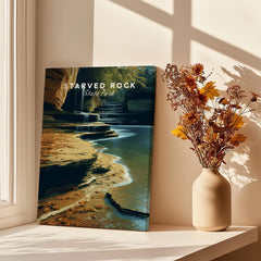 Starved Rock State Park Travel Poster | Scenic River & Rock Wall Art Print displayed beside a flower vase.