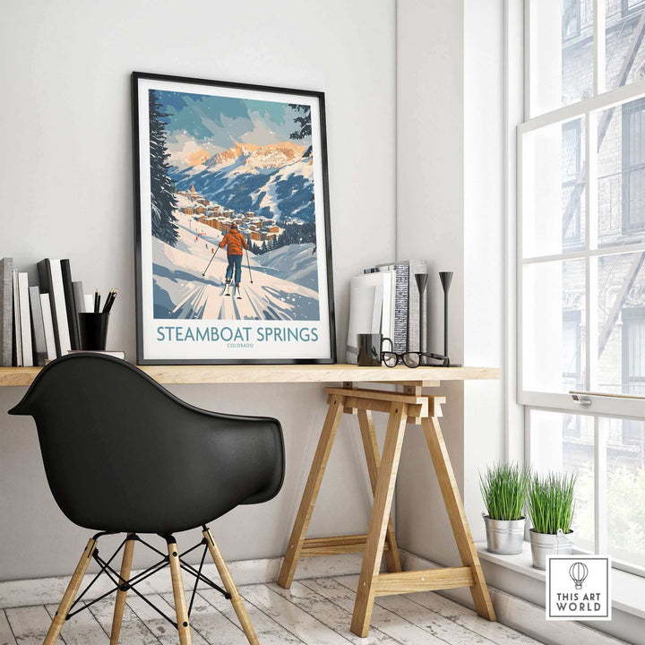 Steamboat Springs ski poster on easel in modern room, showcasing Colorado mountain landscape.