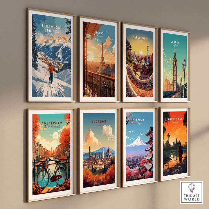 Collection of framed travel posters with Steamboat Springs Ski Poster, Paris, Barcelona, London, Amsterdam, Florence, Tokyo, and Angkor Wat.