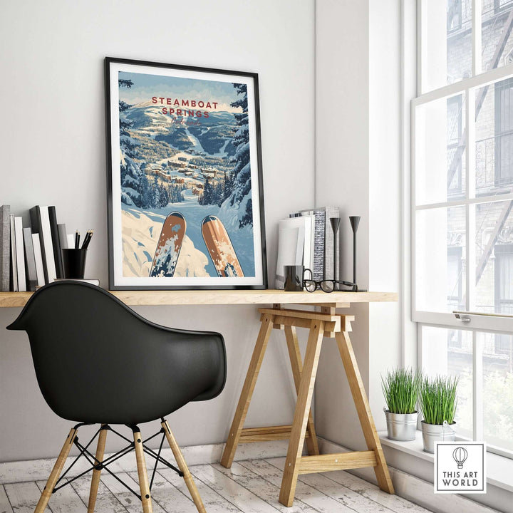 Steamboat Springs travel poster framed in a modern workspace, highlighting vibrant ski scenery and winter landscape.