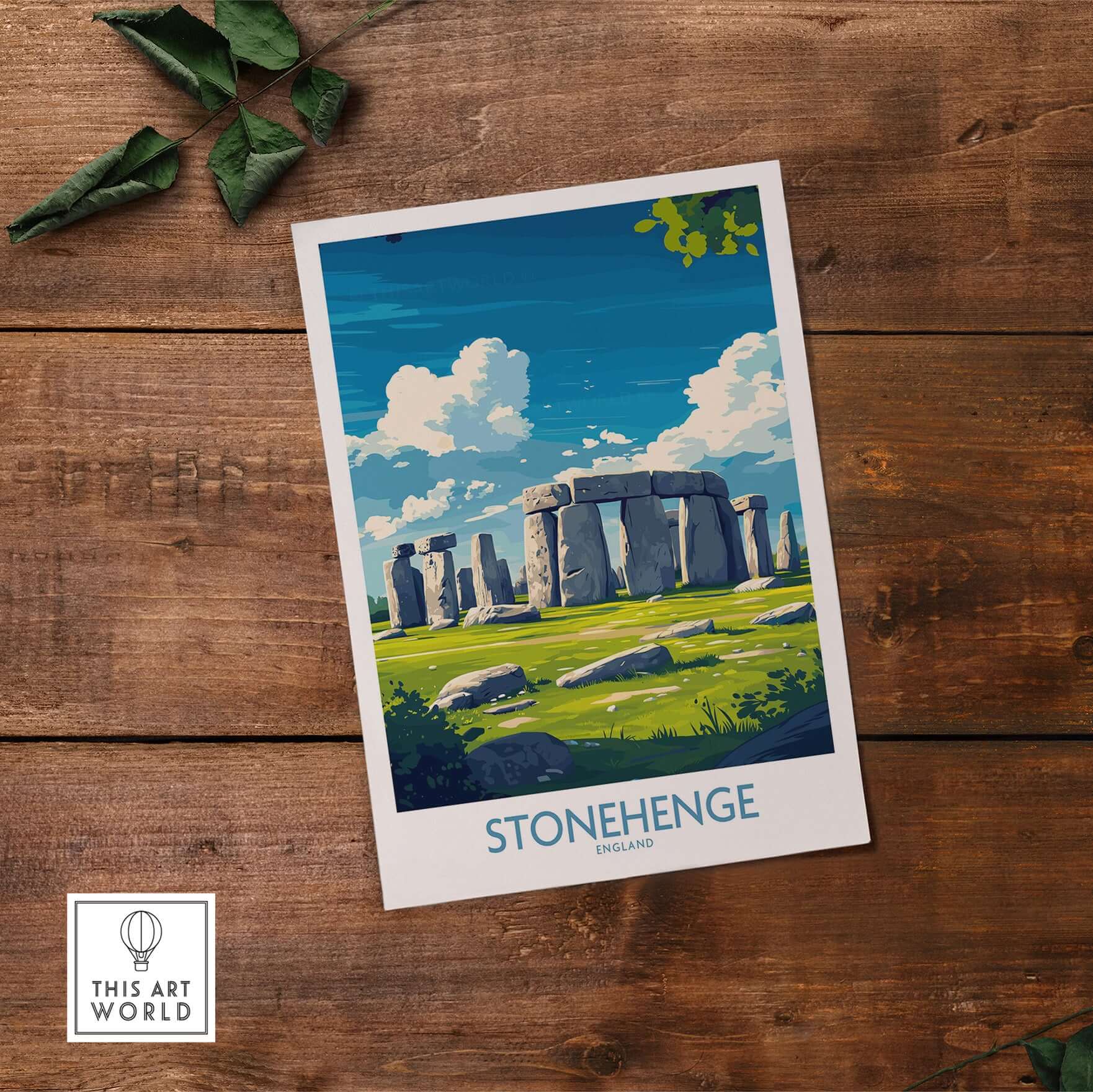 Stonehenge Art Print - England Poster - Wall Decor displayed on wooden surface with greenery.