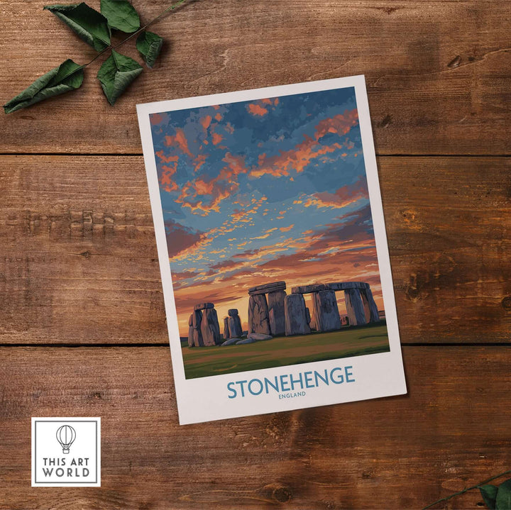 Stonehenge poster art print featuring vibrant orange sky, England prehistoric site wall decor on wooden background.