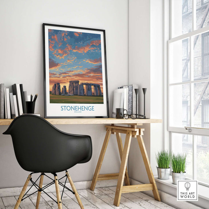 Stonehenge poster on wall above desk featuring orange sky, enhancing modern home decor with historical art.