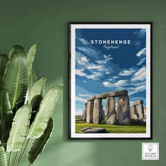 Stonehenge Print - Wiltshire England Wall Art - Historic Monument Poster framed in a room with green wall and plants.