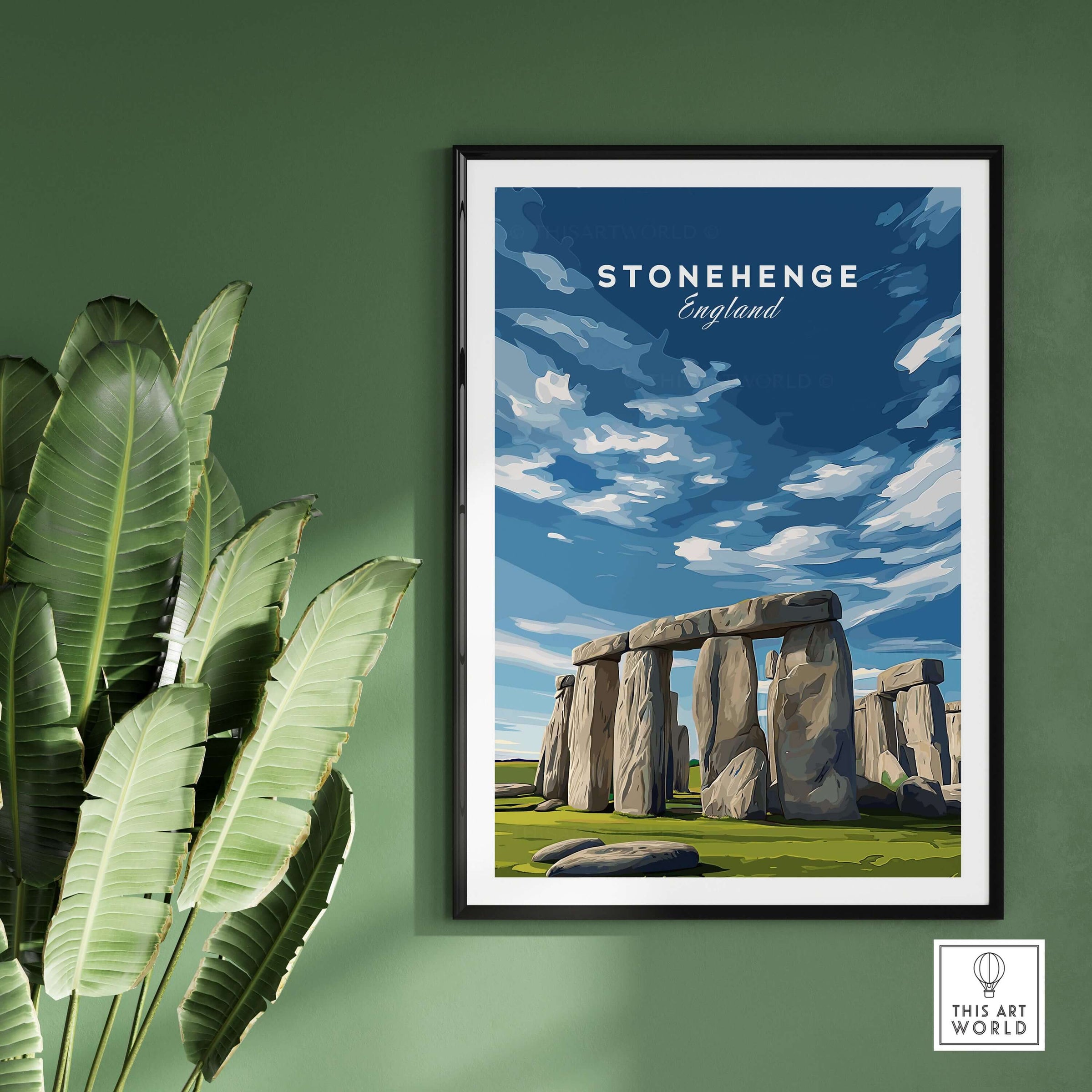 Stonehenge Print - Wiltshire England Wall Art - Historic Monument Poster framed in a room with green wall and plants.