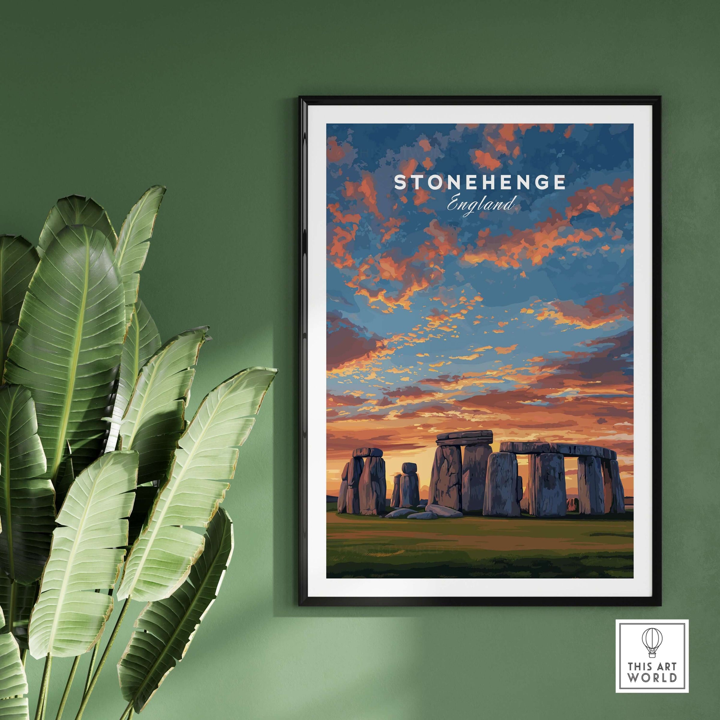 Stonehenge Travel Print - English Countryside Poster - Historic Landmark Wall Art displayed on a green wall with plants.