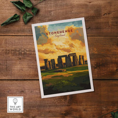 Stonehenge Travel Print - Wiltshire Landscape Poster - English Heritage Wall Art on a wooden table.