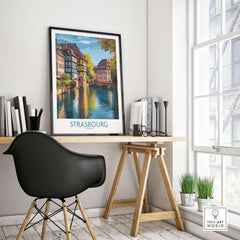 Strasbourg France Art Print displayed in a modern workspace, showcasing the city's architecture and canals.