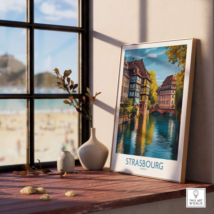 Strasbourg France Art Print showcased in a cozy interior by a window with scenic view and decorative elements.