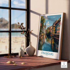 Strasbourg France Art Print | Petite France Travel Poster displayed in a cozy home setting with scenic view.