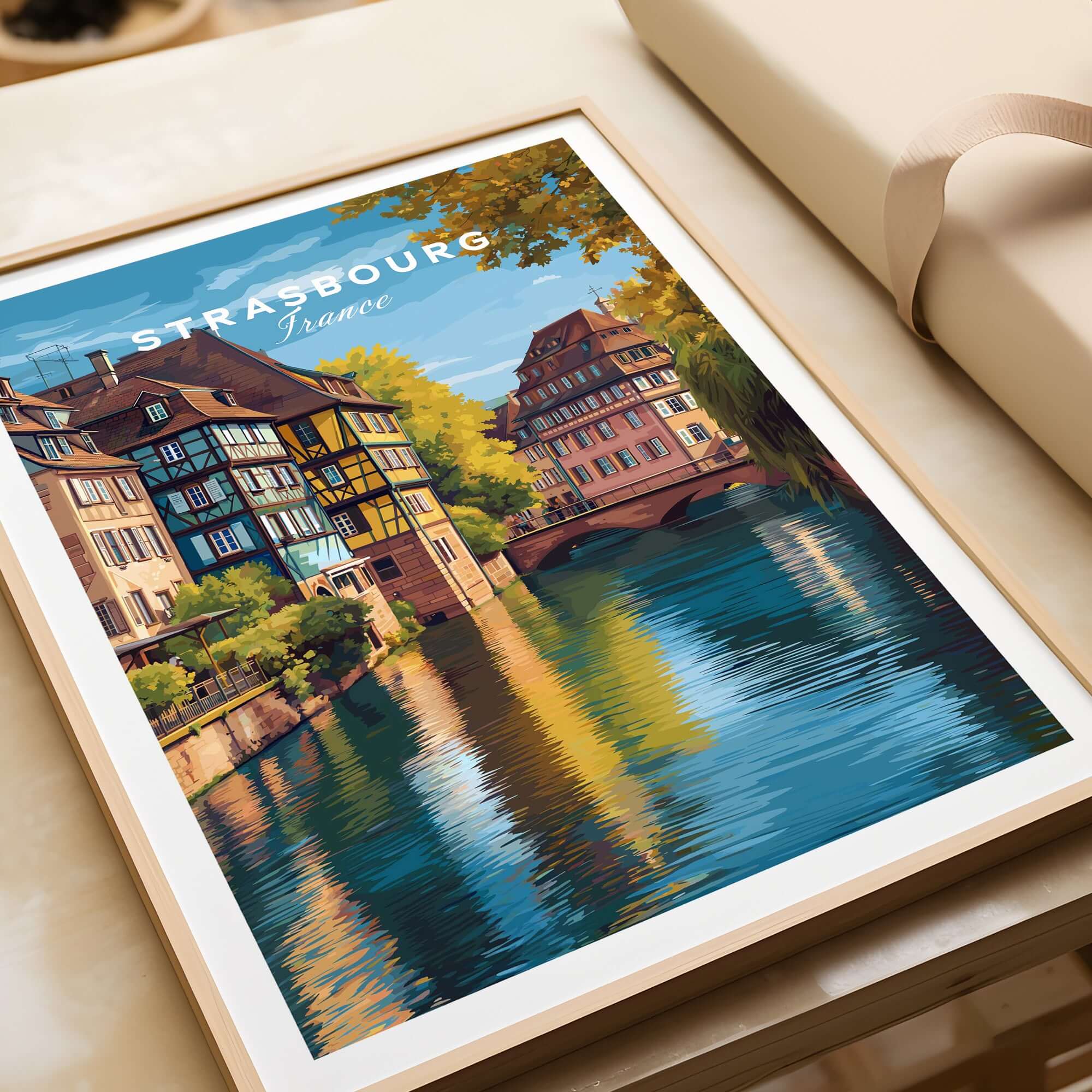 Strasbourg Print France Poster showcasing picturesque architecture by a serene river in Strasbourg, France.