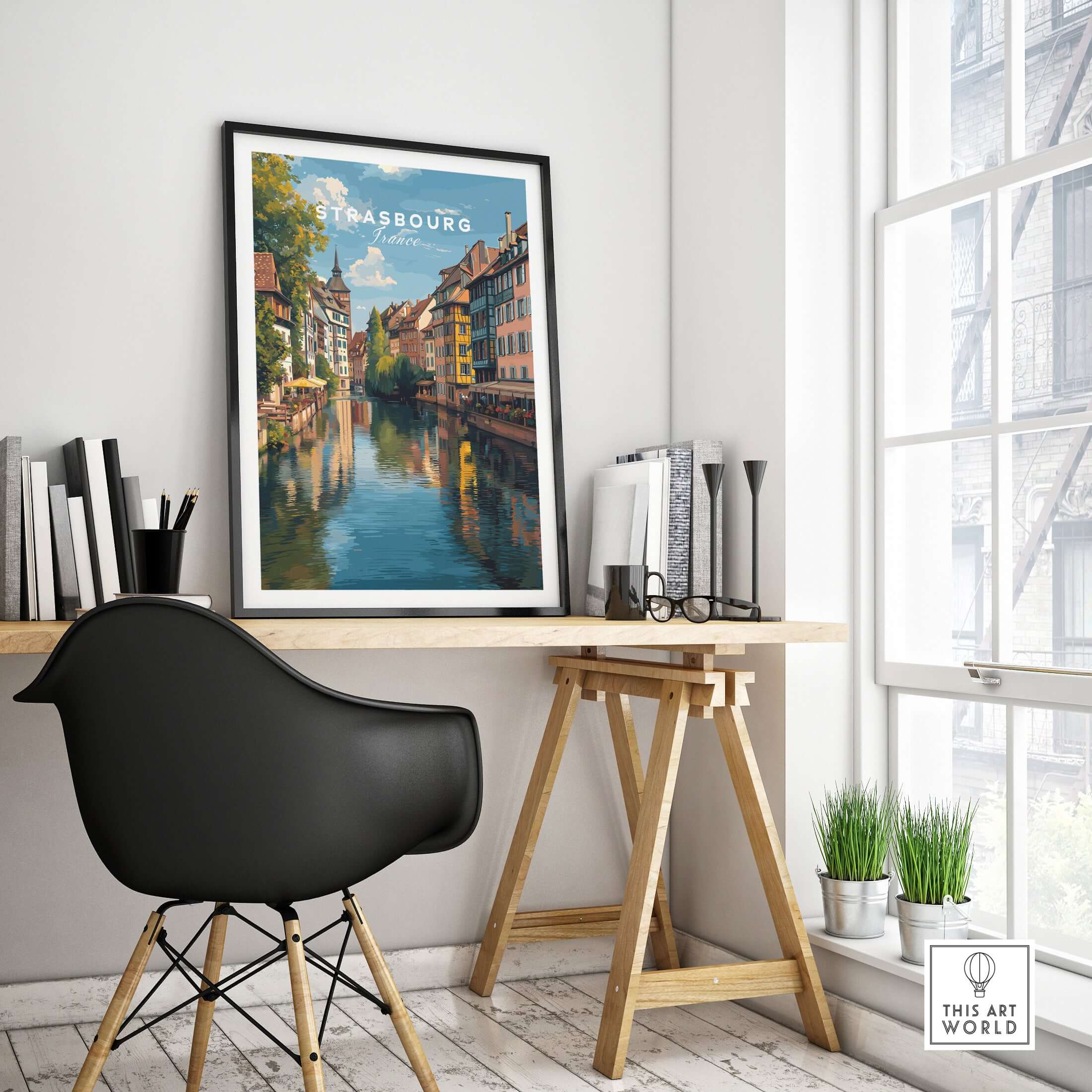 Strasbourg Poster France Wall Decor displayed in a stylish home office, showcasing scenic streets and canals of Strasbourg.