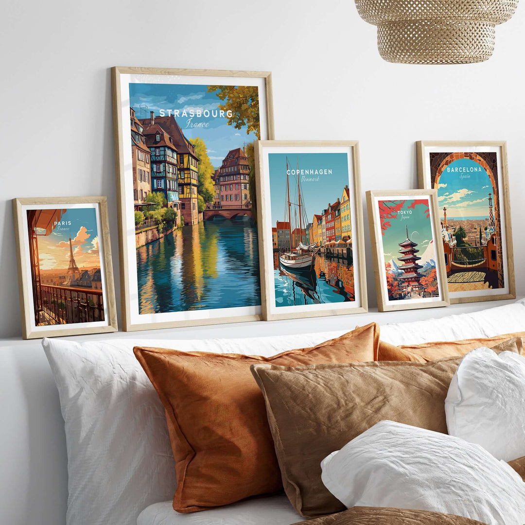 Strasbourg Print France Poster displayed among framed travel posters on a stylish home decor setup.