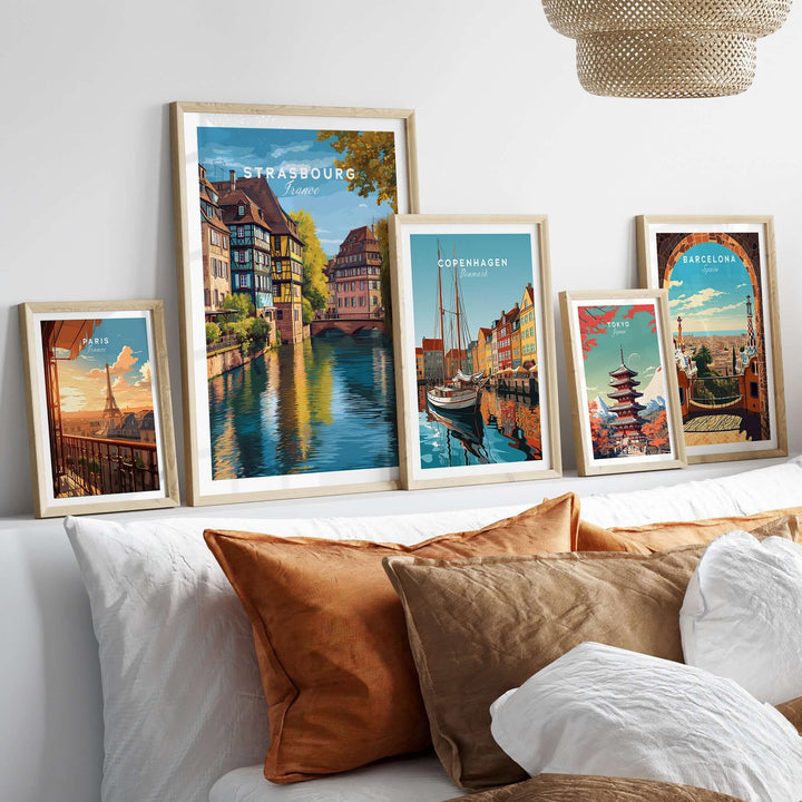 Strasbourg Print France Poster displayed among framed travel posters on a stylish home decor setup.